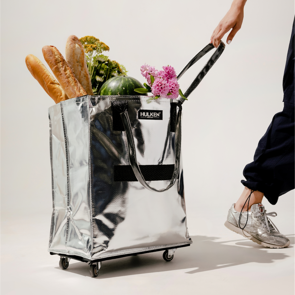 Silver tote bag with groceries